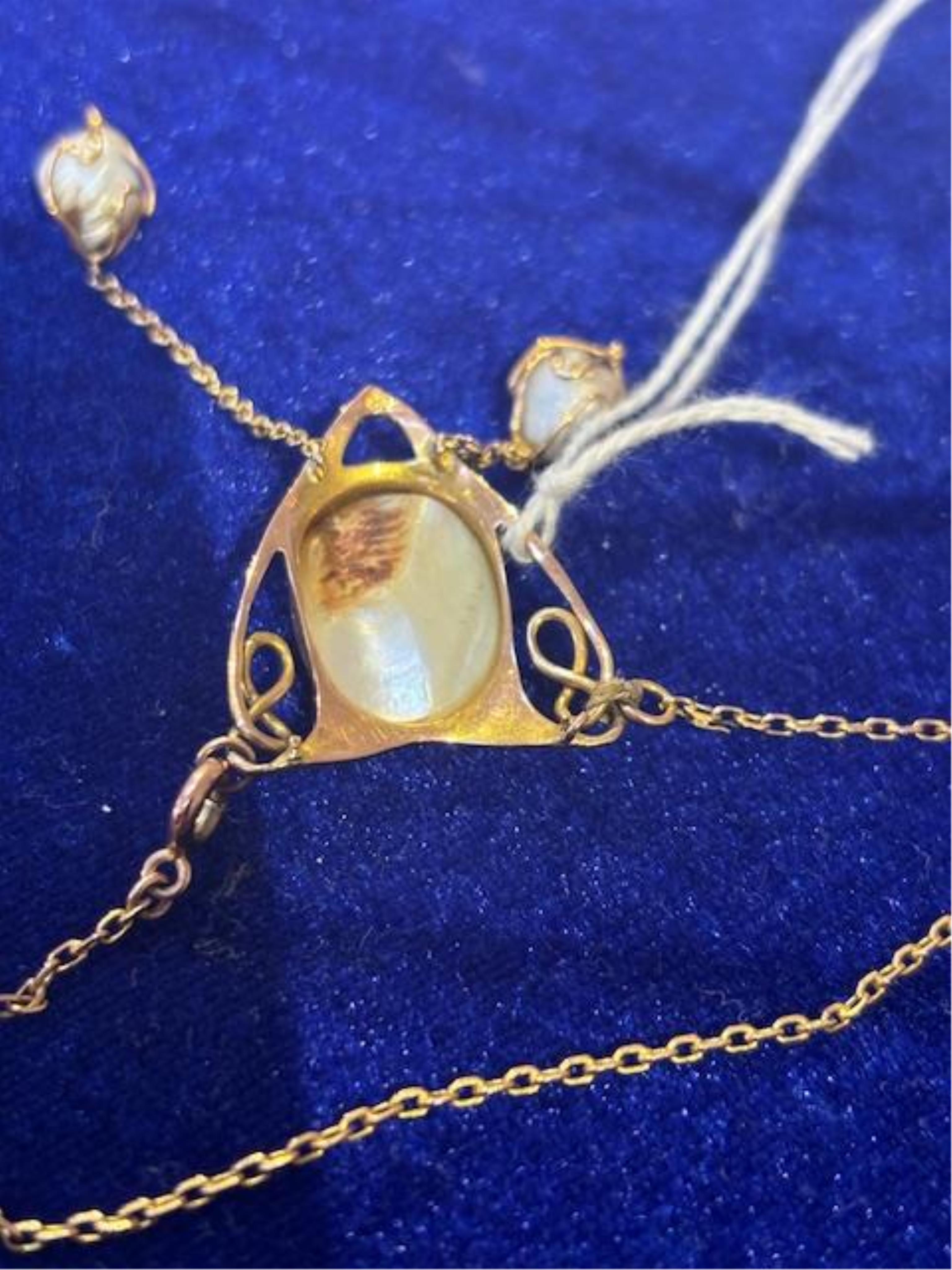 An Art Nouveau 9ct gold, mother of pearl and baroque pearl drop set pendant necklace